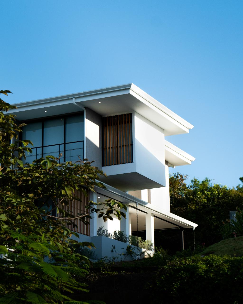 Residential building with multiple windows suggesting distinct private zones