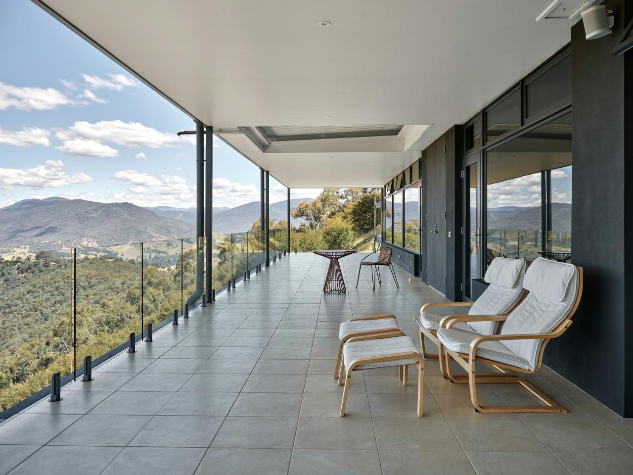 Furnished balcony with shade and a long view toward mountains